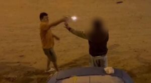 Policía dispara en la cabeza a joven que cobraba parqueo